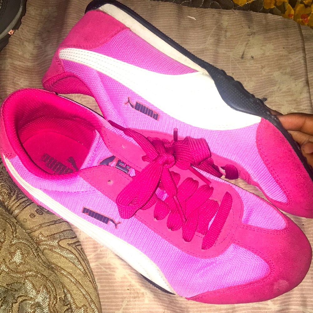 Pink and white puma sneakers